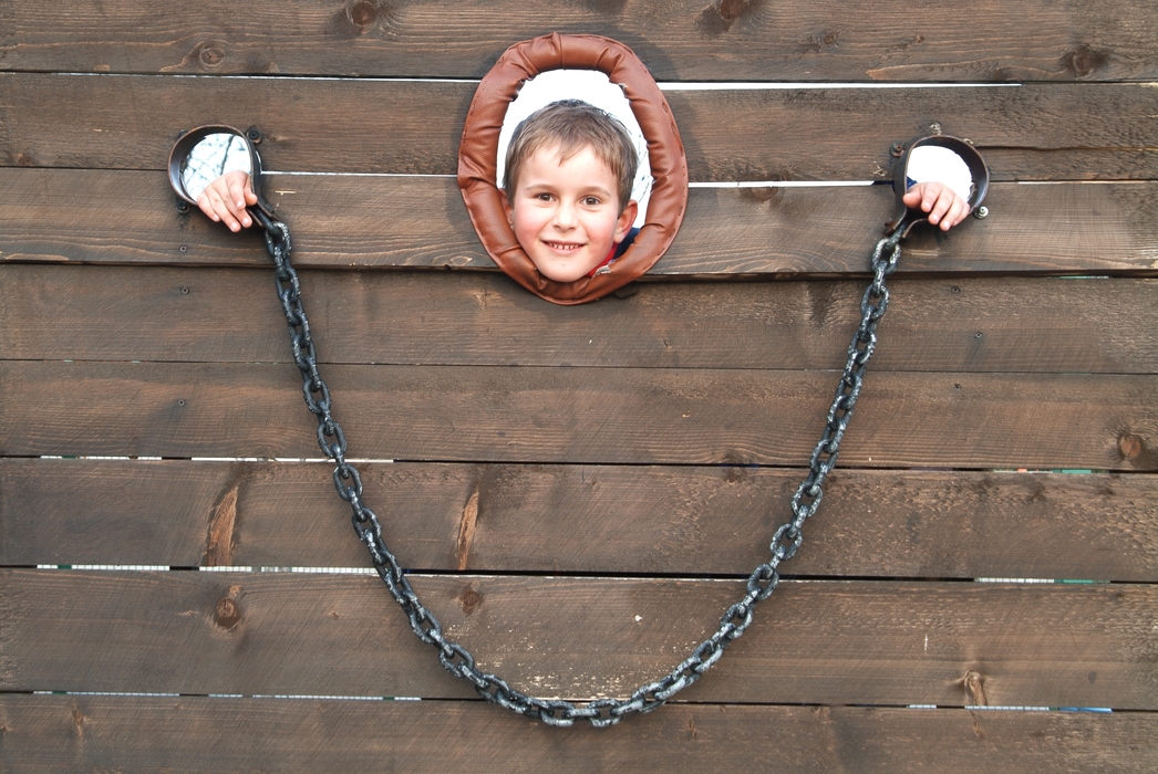 Boy At The Amusement Park