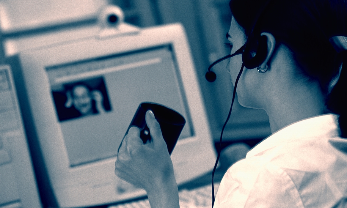 Woman At Her Computer