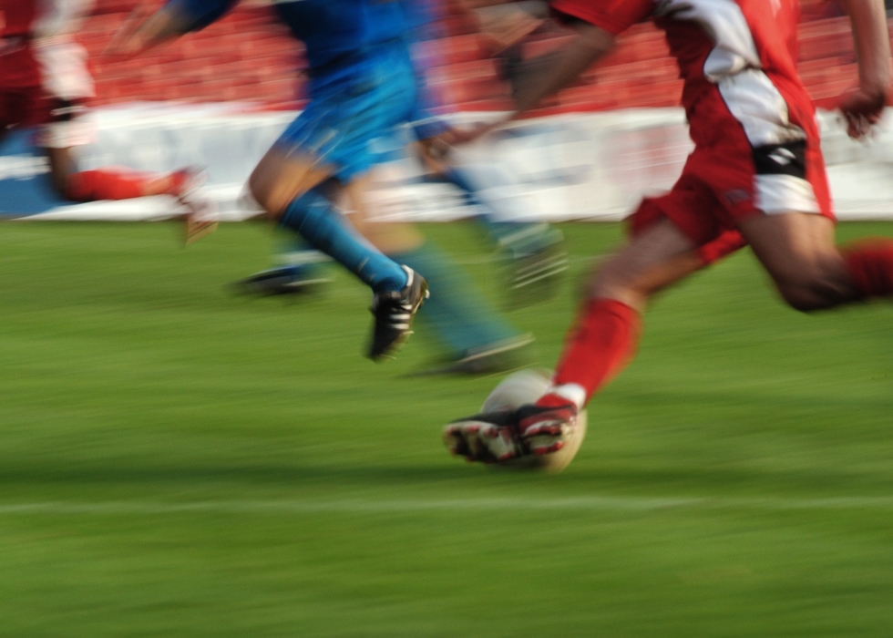 European Football: Soccer Players Advance the Ball