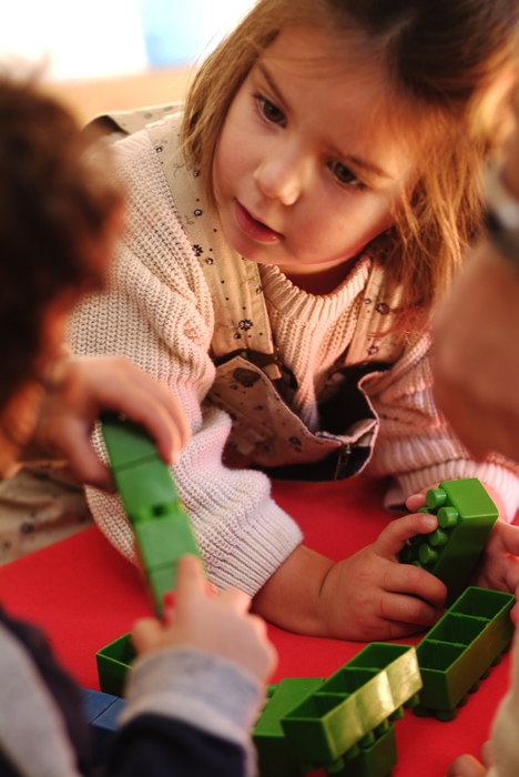 Young Girl with Building Blocks