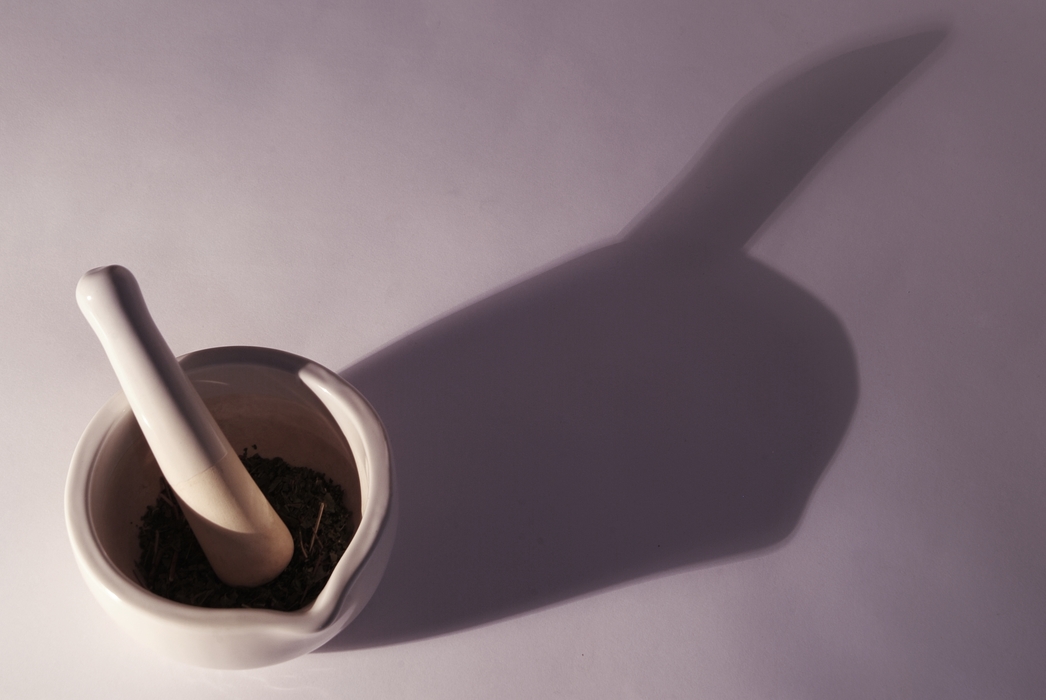 Mortar and Pestle with Dramatic Shadow