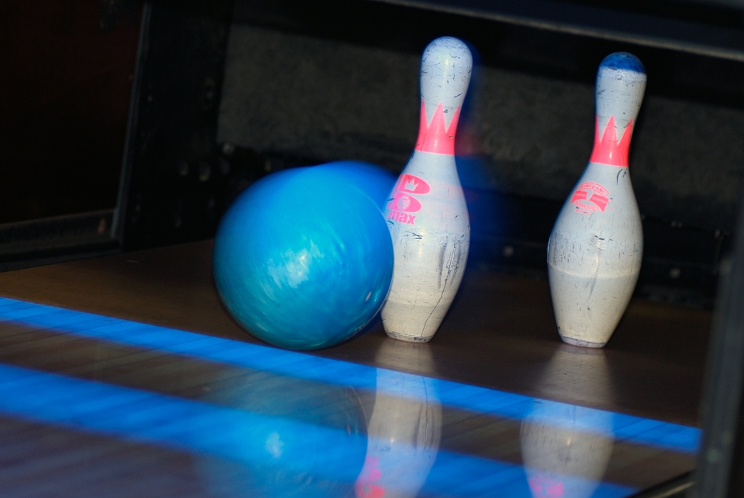 Bowling Ball Approaches Pins