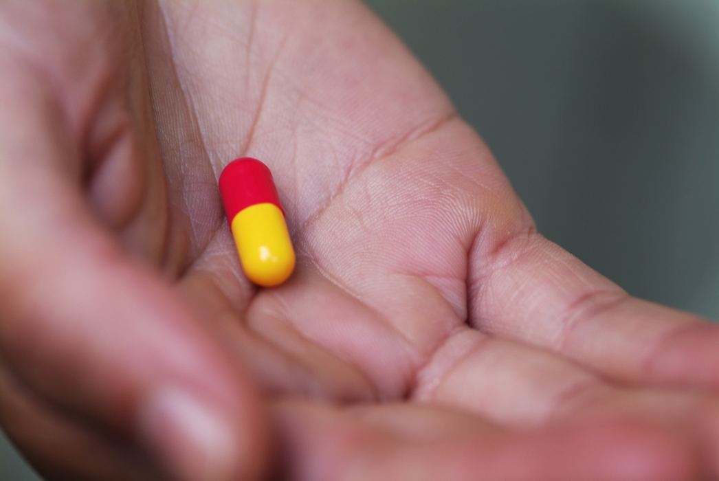 Hand Holding Medication