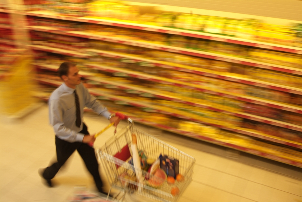 Shopping with Grocery Cart at Supermarket