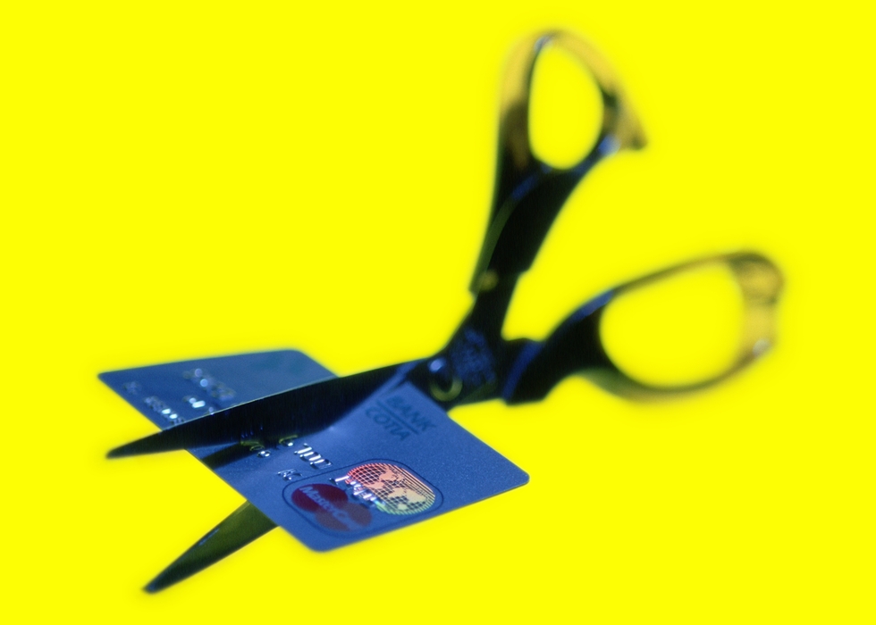 Scissors Cutting a Credit Card