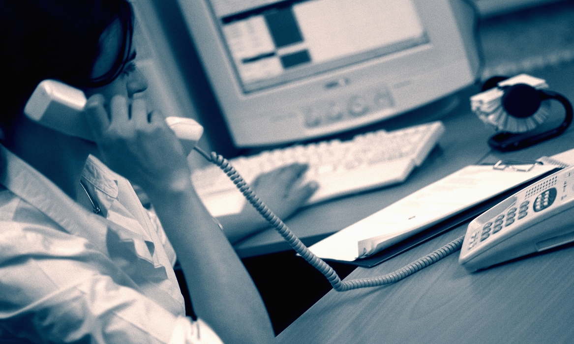 Woman Answering The Phones