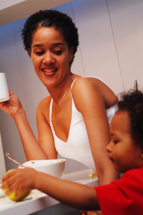 Mother and Son Having Breakfast