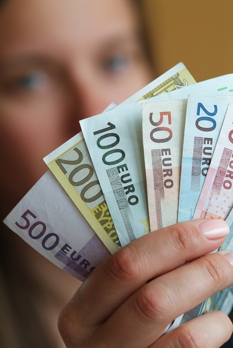 Woman Holding Euro Money Bills