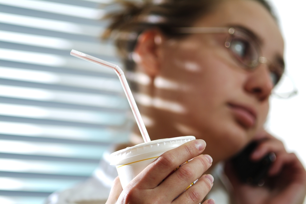 Woman Talking on the Phone During Break