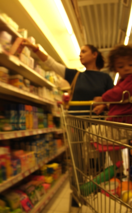 Child with Grocery Cart at Supermarket