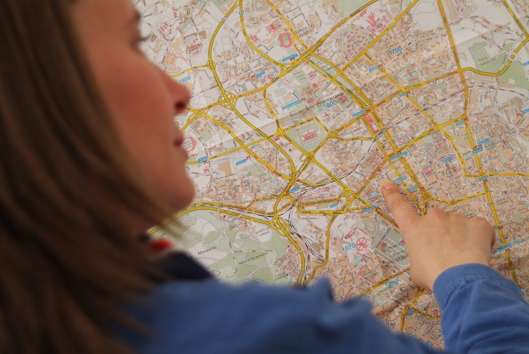 Travel Agent Pointing At Map