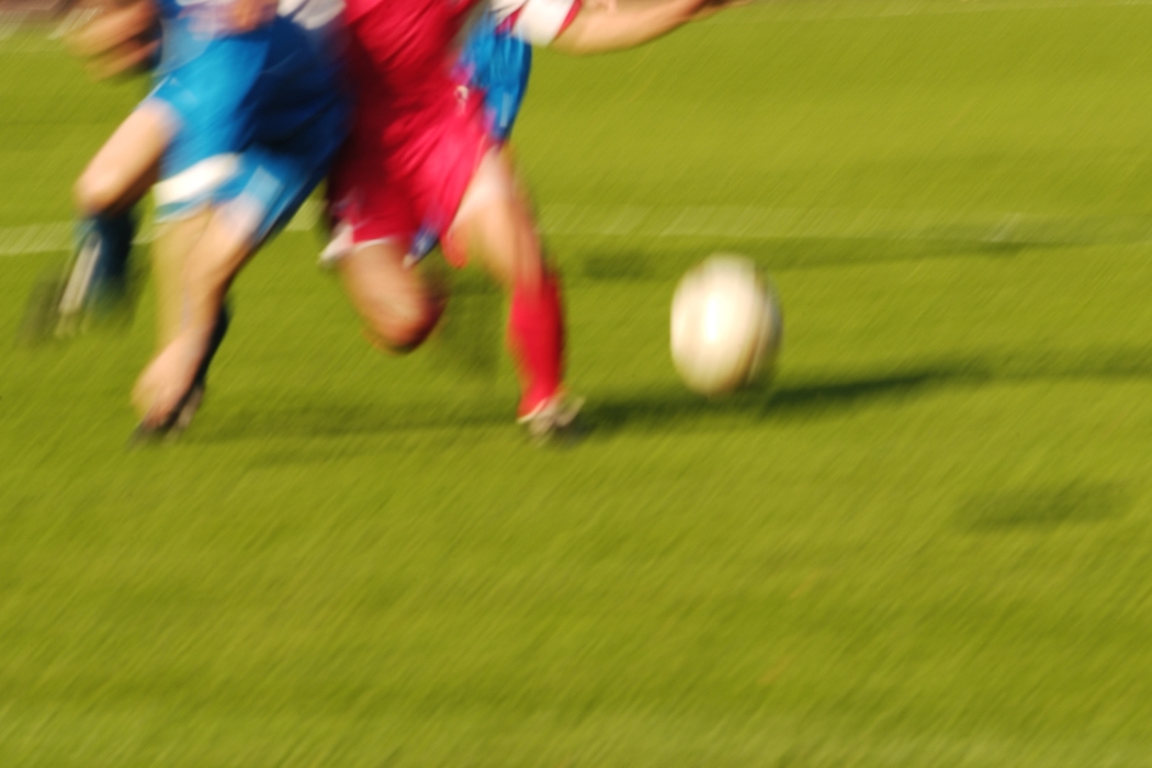 European Football: Soccer Players Race to the Ball