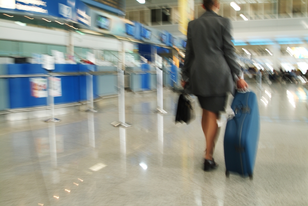 Businesswoman Walking with Her Luggage