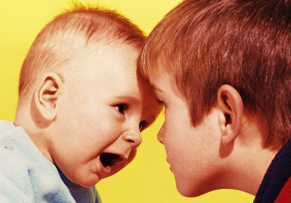 Brothers Looking At Each Other