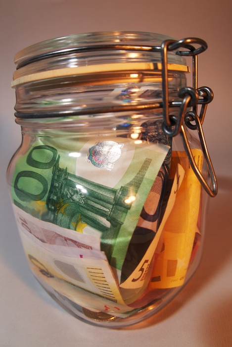 Jar of Euro Money Bills and Coins