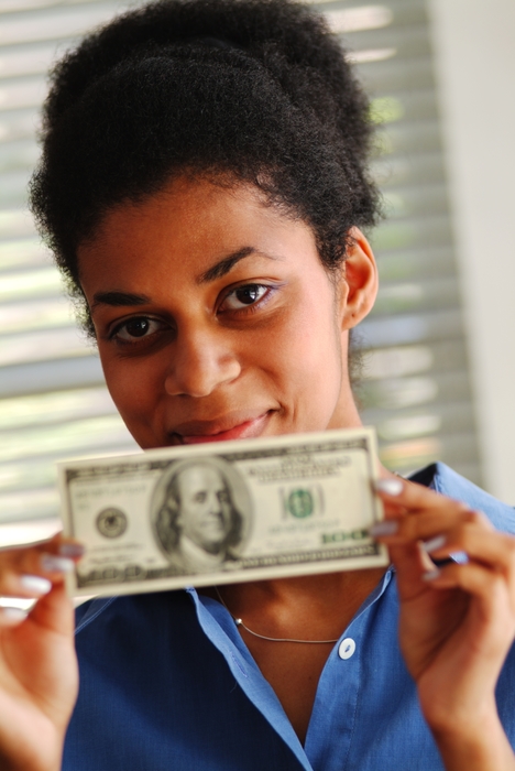 Woman Holding U.S. One Hundred Dollar Money Bill