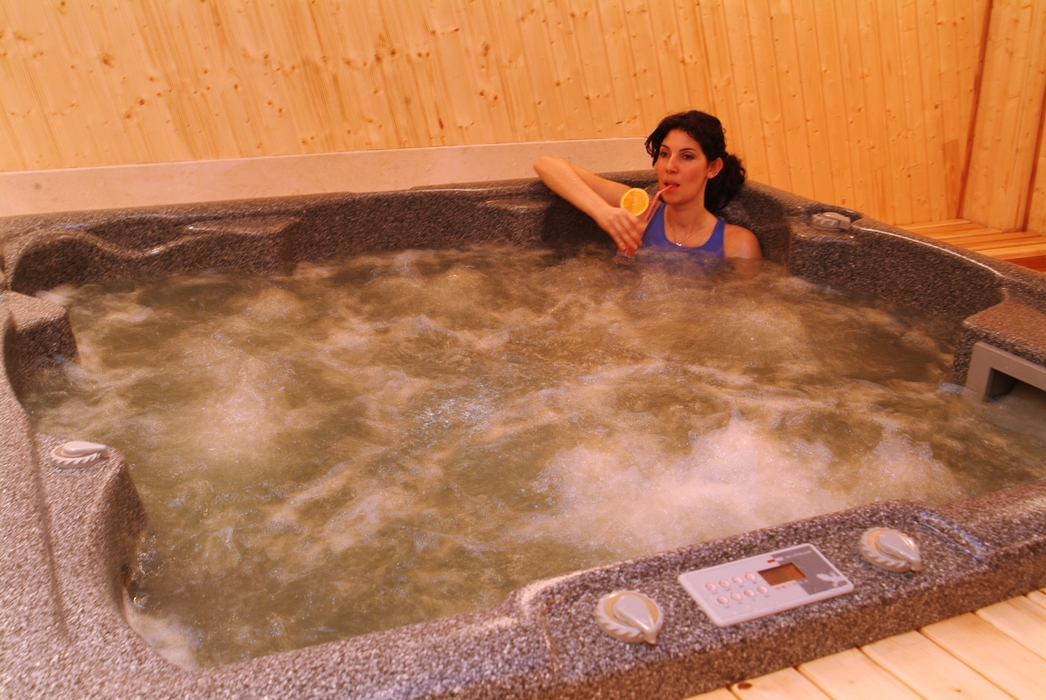 Woman Relaxing in the Whirlpool