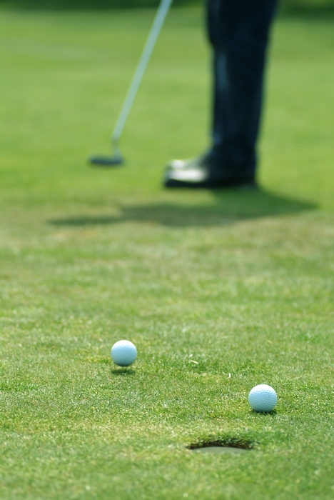 Golfer Practicing Putting