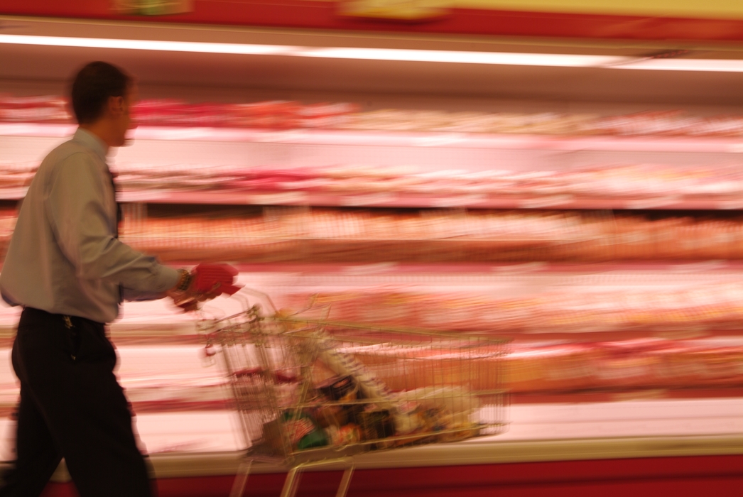 Shopping with Grocery Cart at Supermarket