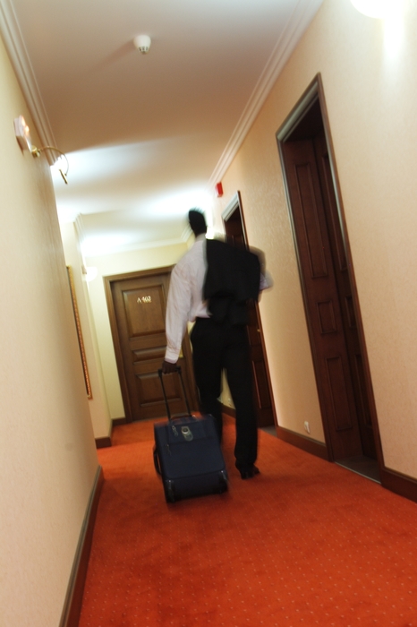 Businessman Leaving Hotel Room