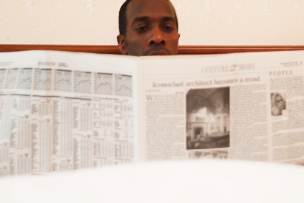 Businessman Reading Newspaper