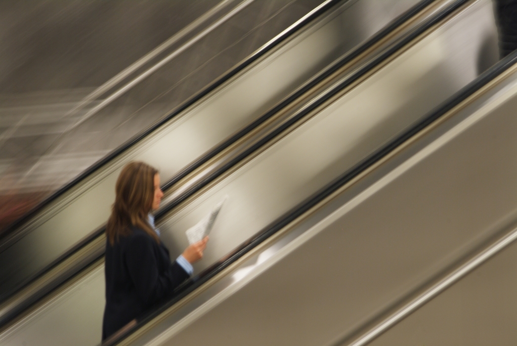 Woman on a Escalator