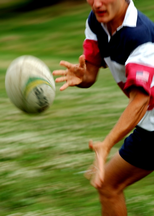 Rugby Player Catches the Ball