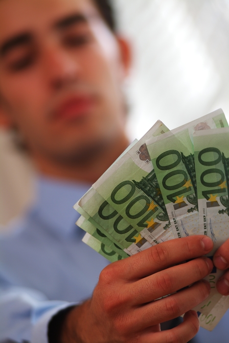 Man Counting Euro Money Bills