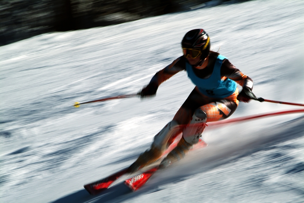 Downhill Skier Tight Turn During Downhill Ski Race