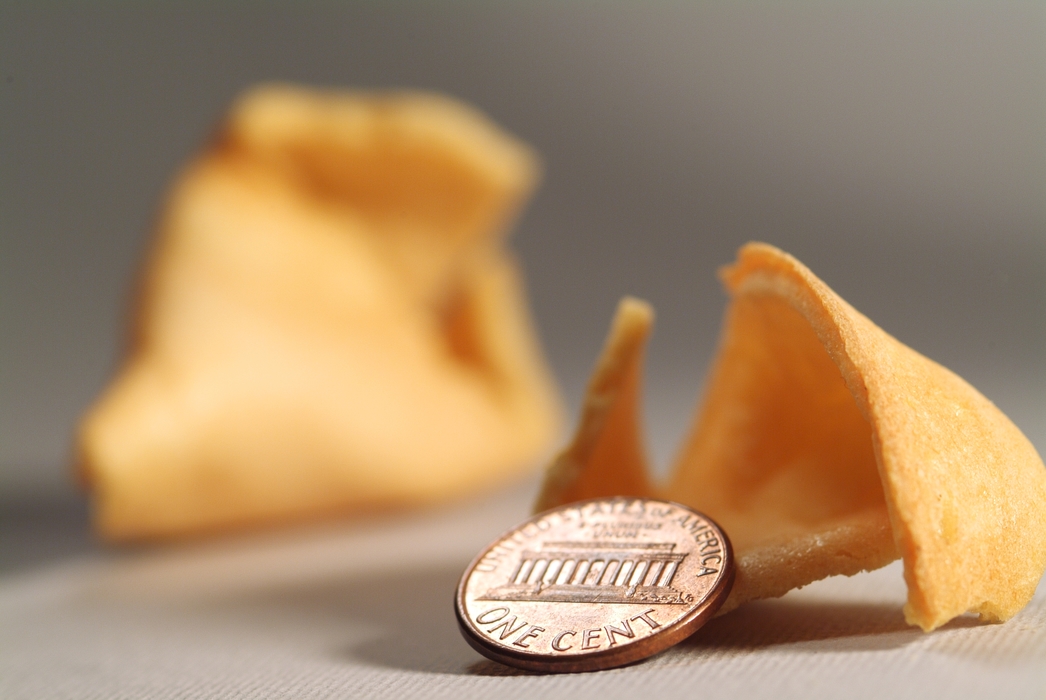 Financial Concept Fortune Cookie with Coin