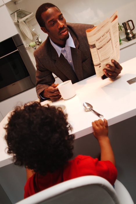 Father and Son Having Breakfast