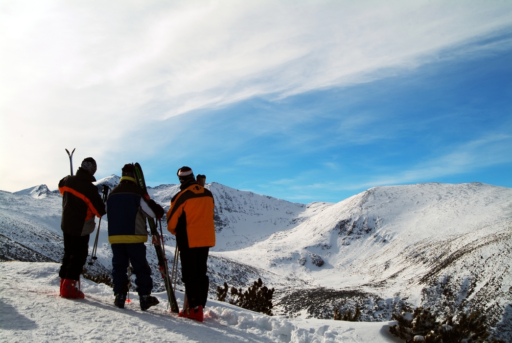 Skiers Prepare for a Day on the Slopes Downhill Skiing