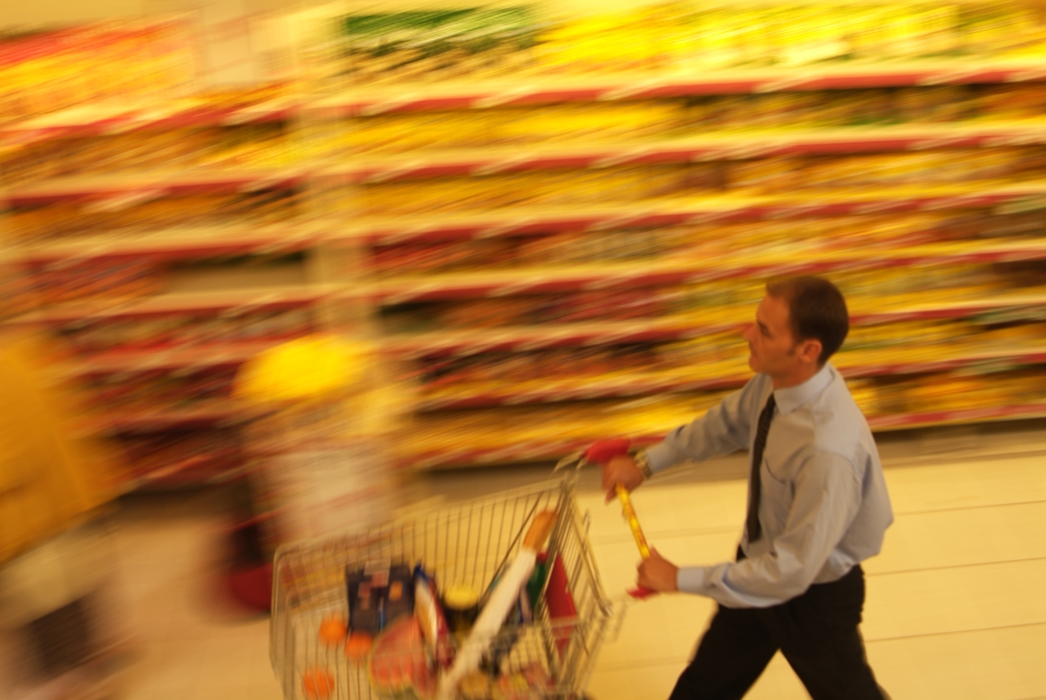 Shopping with Grocery Cart at Supermarket