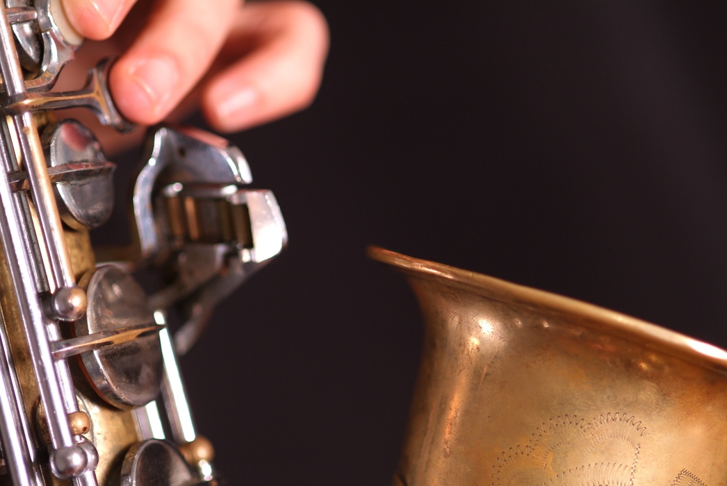 Symphony Orchestra Saxophonist Close-Up Fingers on Keys