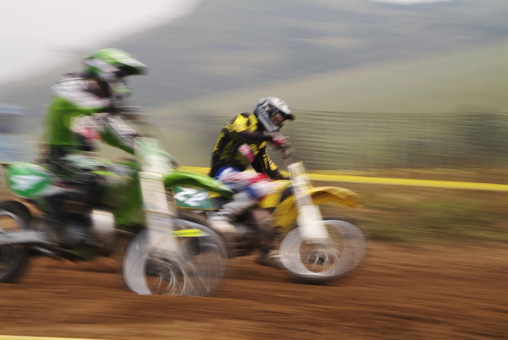 Motocross Racing Two Races Make a Turn