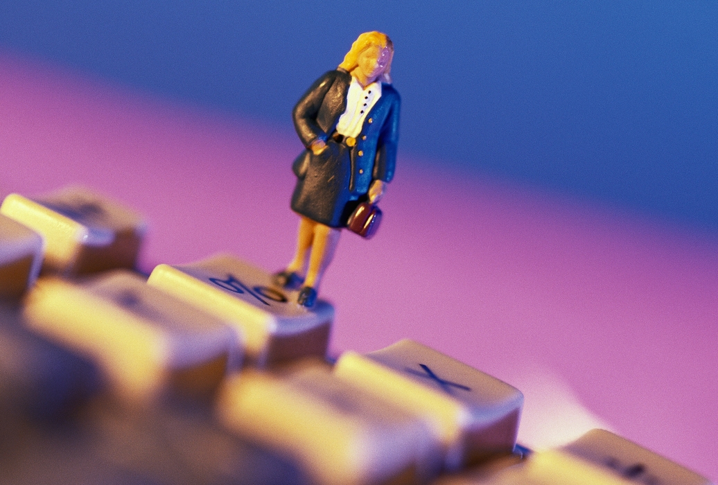 Toy People - Businesswoman Standing on Keyboard
