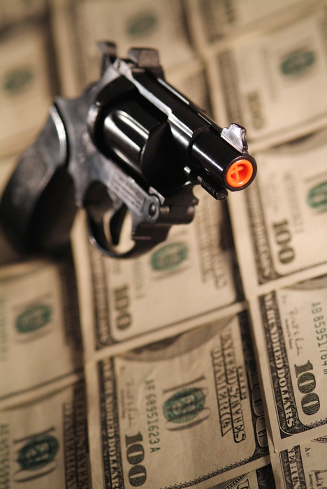 Financial Concept with Hand Gun