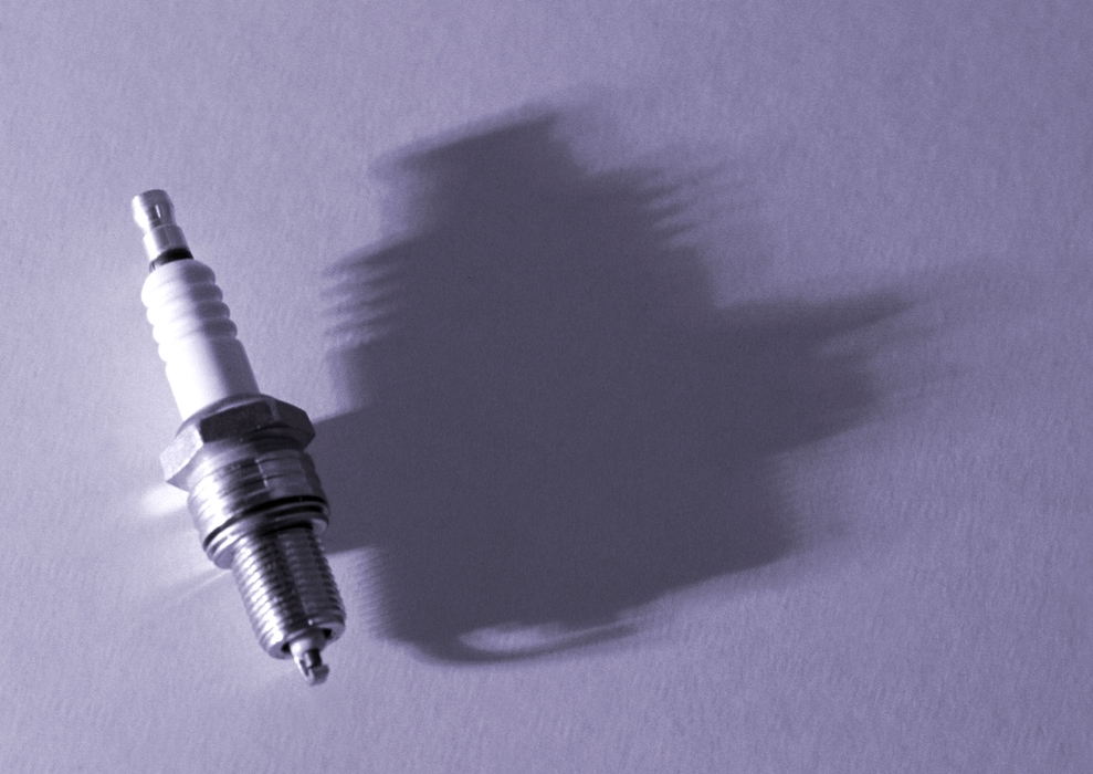 Spark Plug with Dramatic Shadow