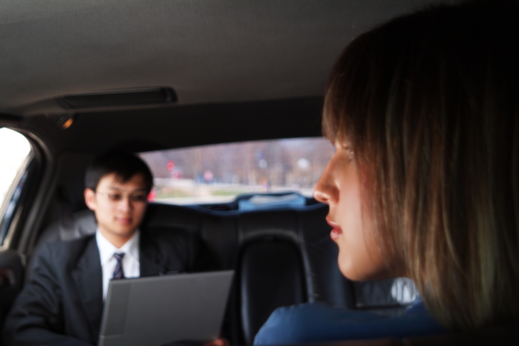 Business People in a Limousine