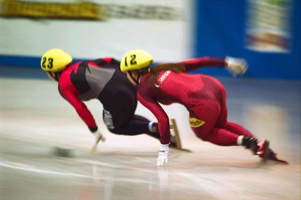 Speed Skaters in Tight Competition