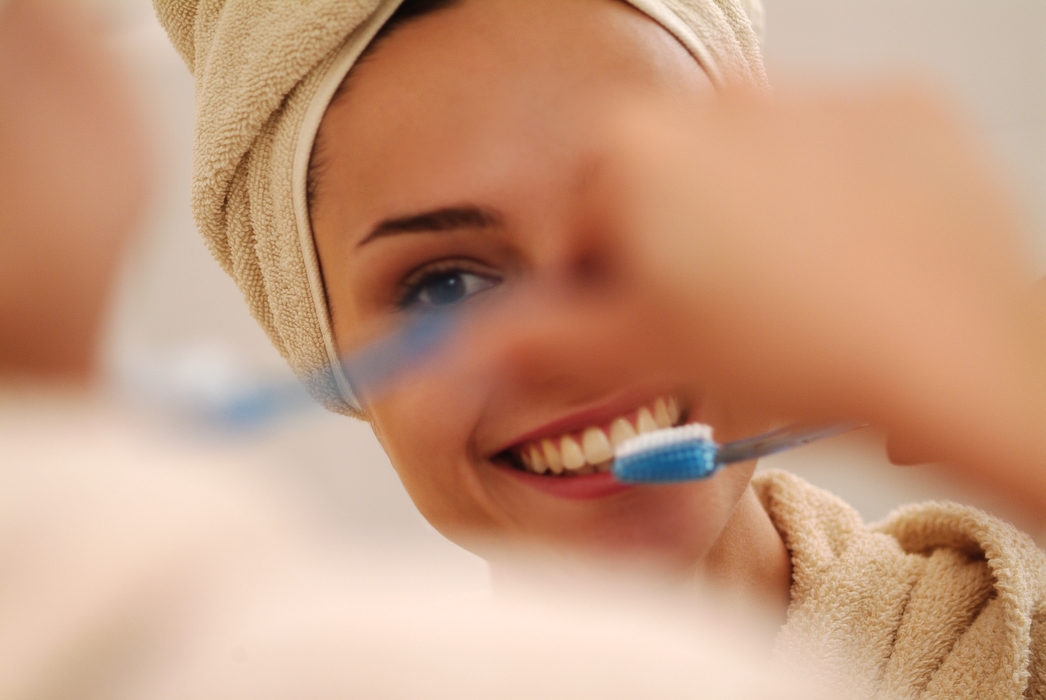 Woman Brushing Her Teeth