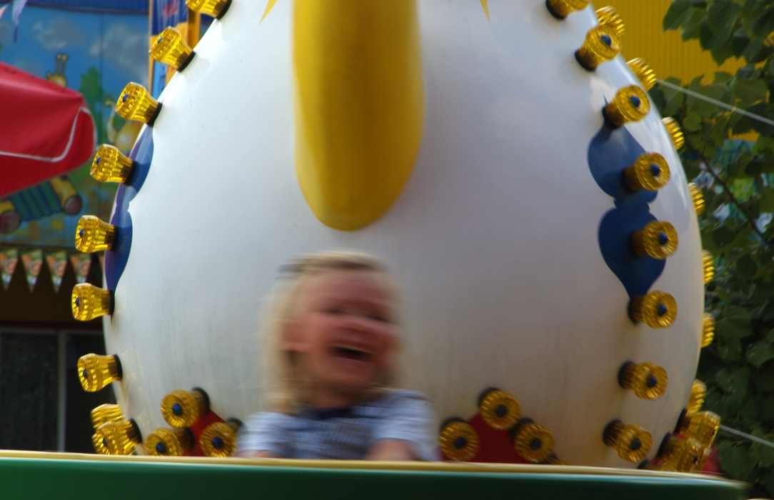 Girl on Amusement Park Ride