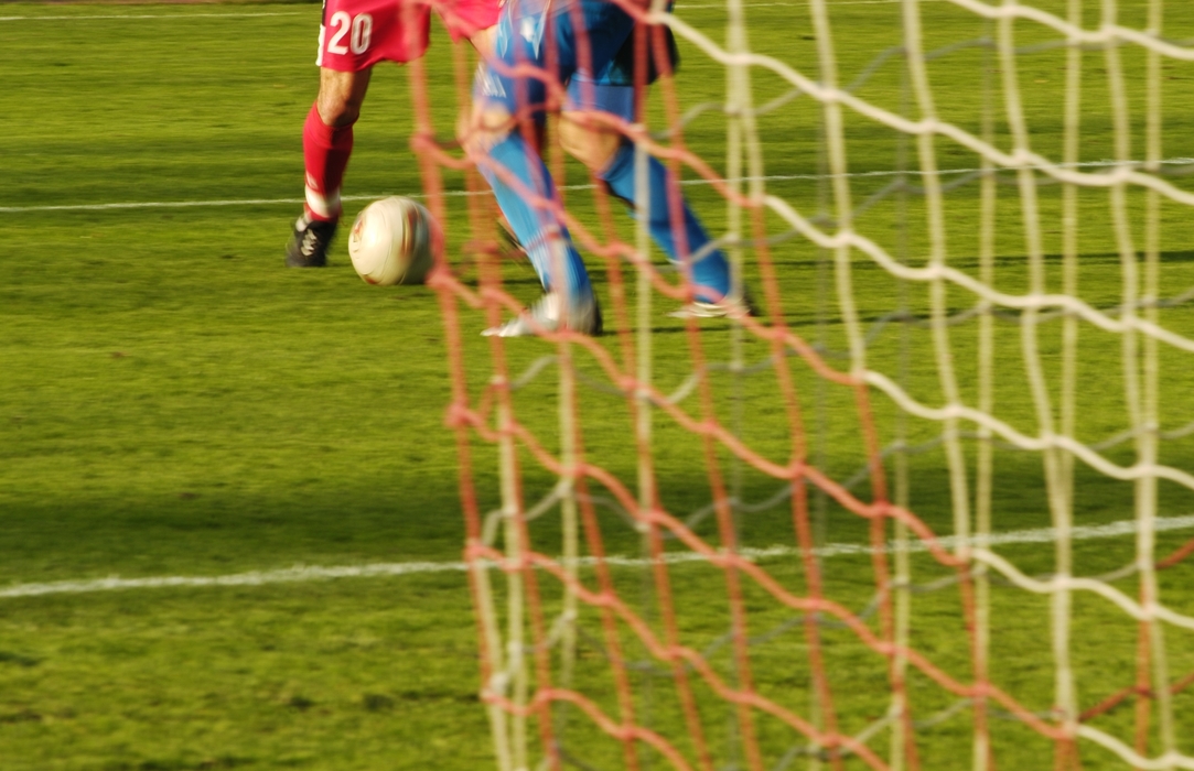 European Football: Soccer Player Shot on Net