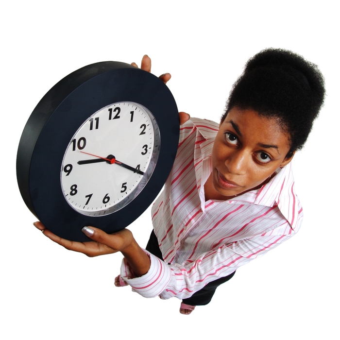 Businesswoman Holding a Clock