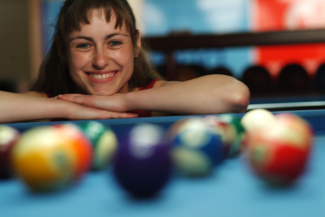 Woman Enjoying Game of Pool