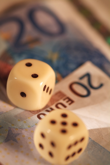Financial Concept with Dice Rolling Lucky Seven