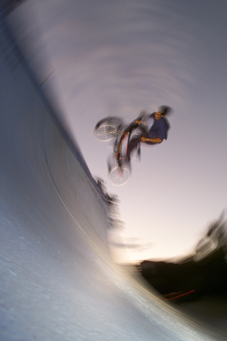 Extreme Biking in Half-Pipe