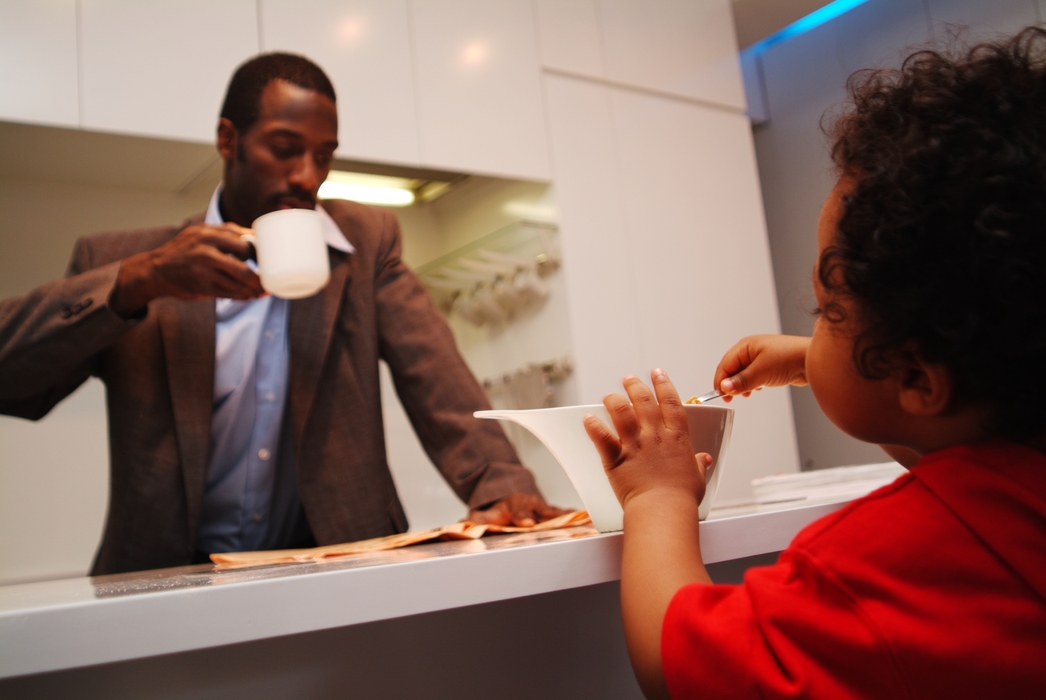 Father and Son Having Breakfast