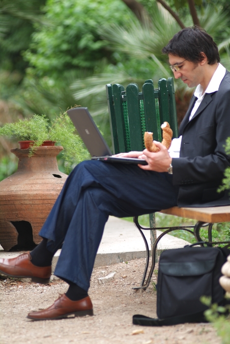 Businessman Having Lunch in The Park