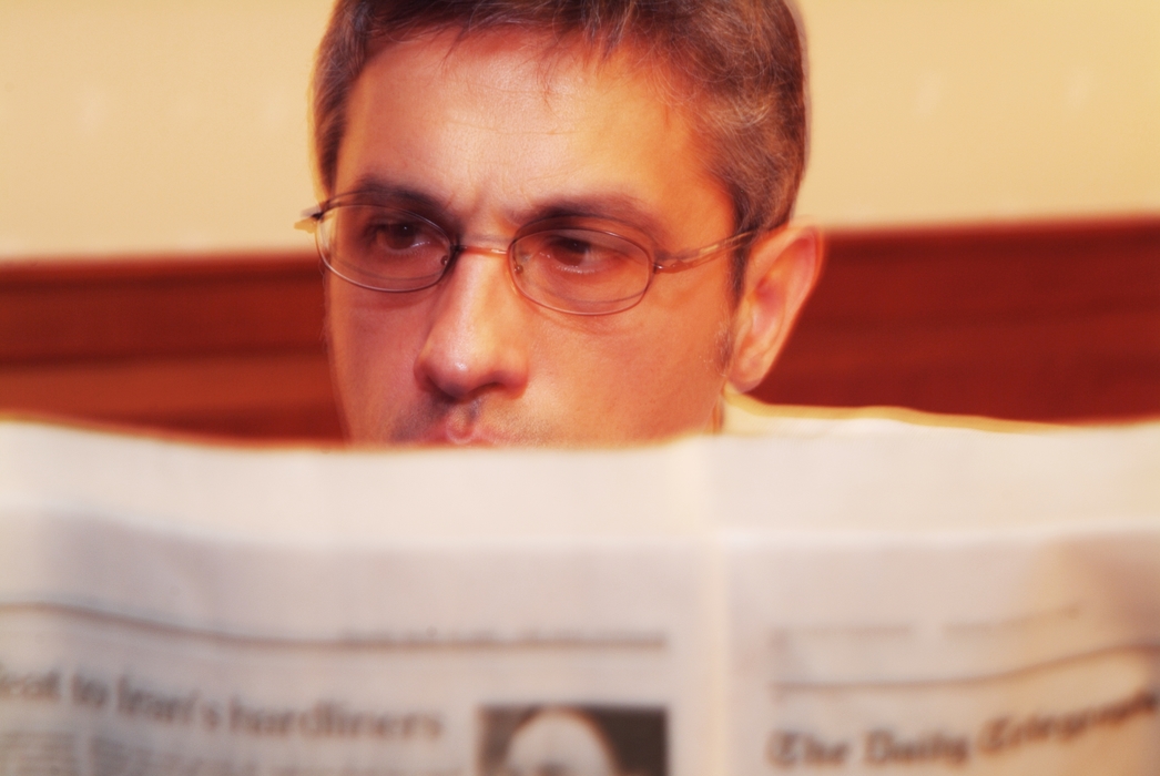 Businessman Reading Newspaper